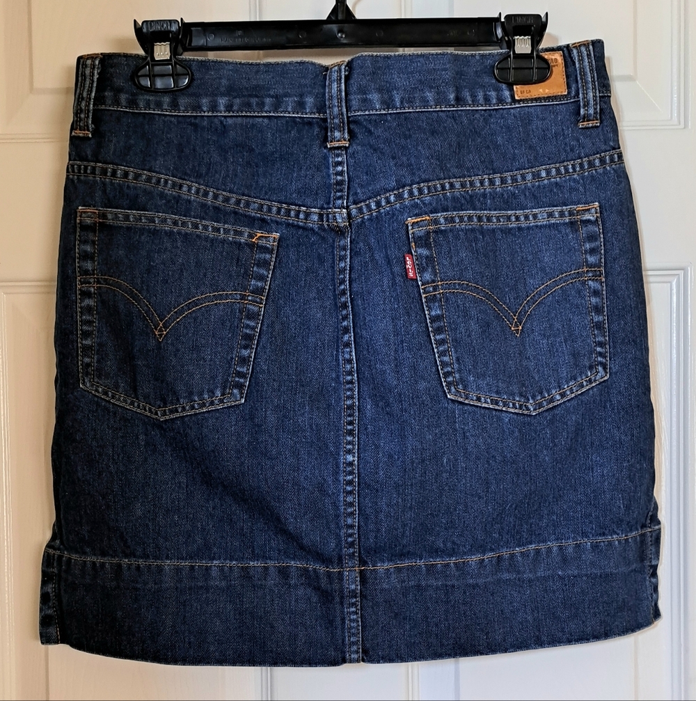 Levi's navy blue denim with tan leather patch